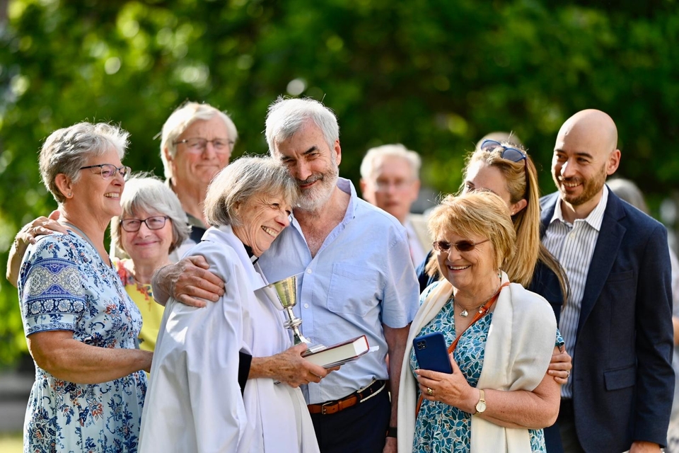 The Rev Jill Phipps celebrates with family and friends after the service