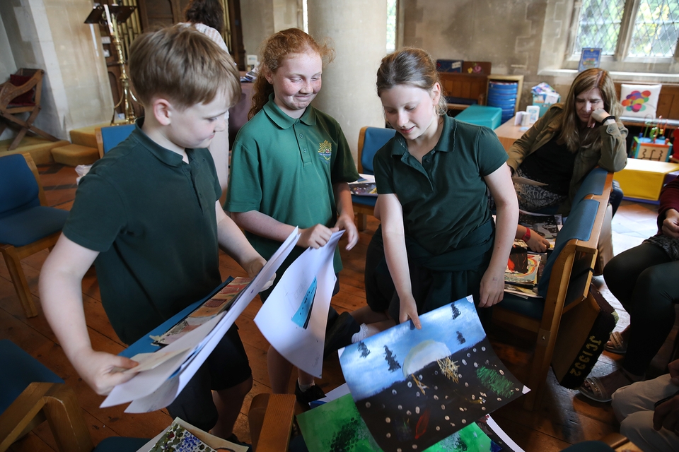 Pupils compare their pictures within St Mary’s Church, Warsash