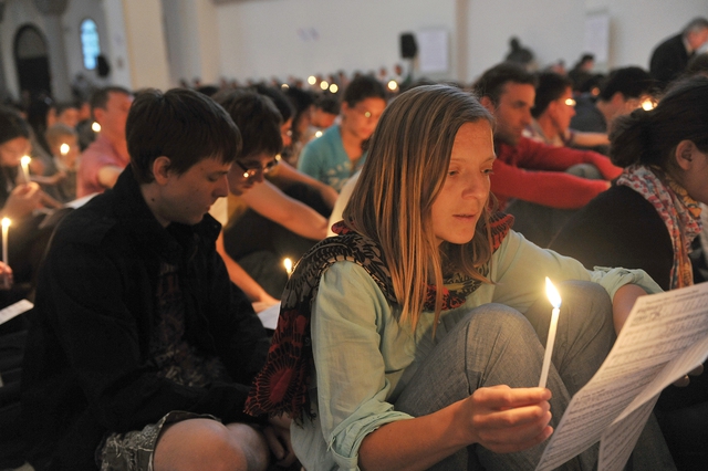 Young people in worship at Taizé