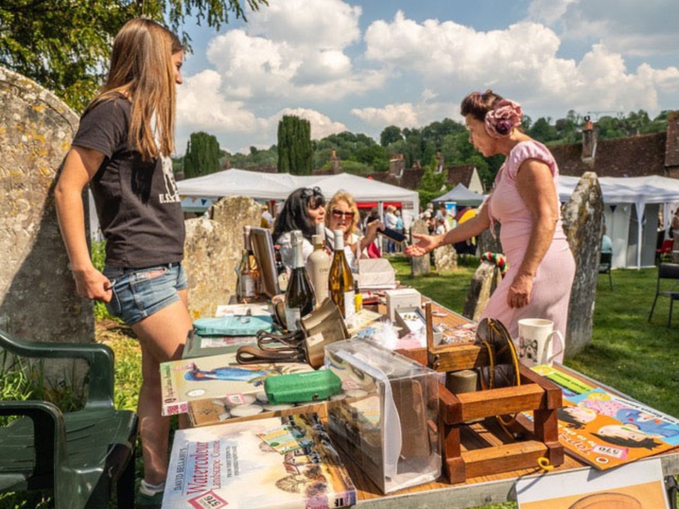 Visitors sample the craft and produce on display