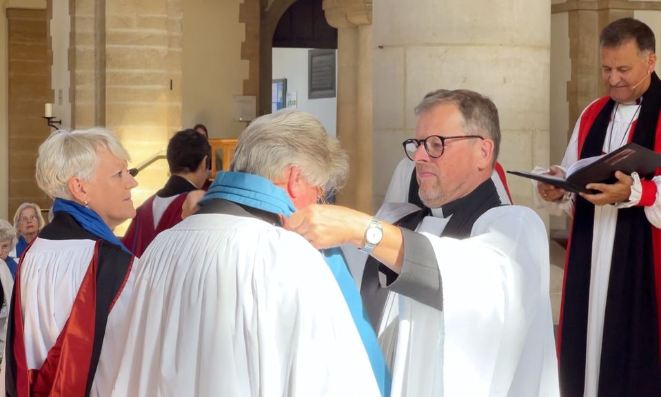 Rev Peter Hall, Diocesan Director of Vocations and Ordinands, places a Reader’s stole on Tim McIlroy