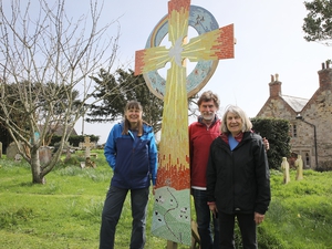 Mosaic cross dedicated in churchyard