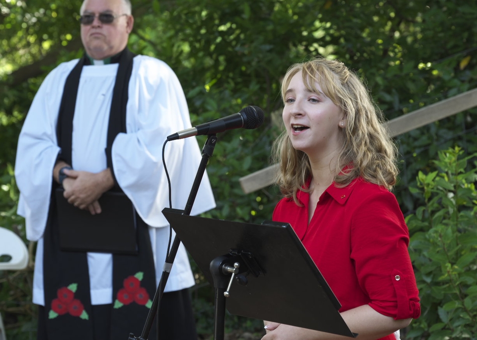 The Canadian National Anthem was sung by student Karis Wygiera, who is studying in Guildford