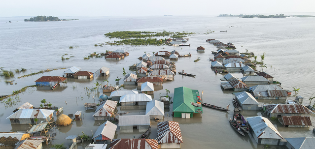 A damaged, submerged area is seen after flash floods in Sunamganj, Bangladesh;   📸 Muhmmad Amdad Hossain / Climate Visuals