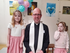 Two girls baptised at Messy Church service
