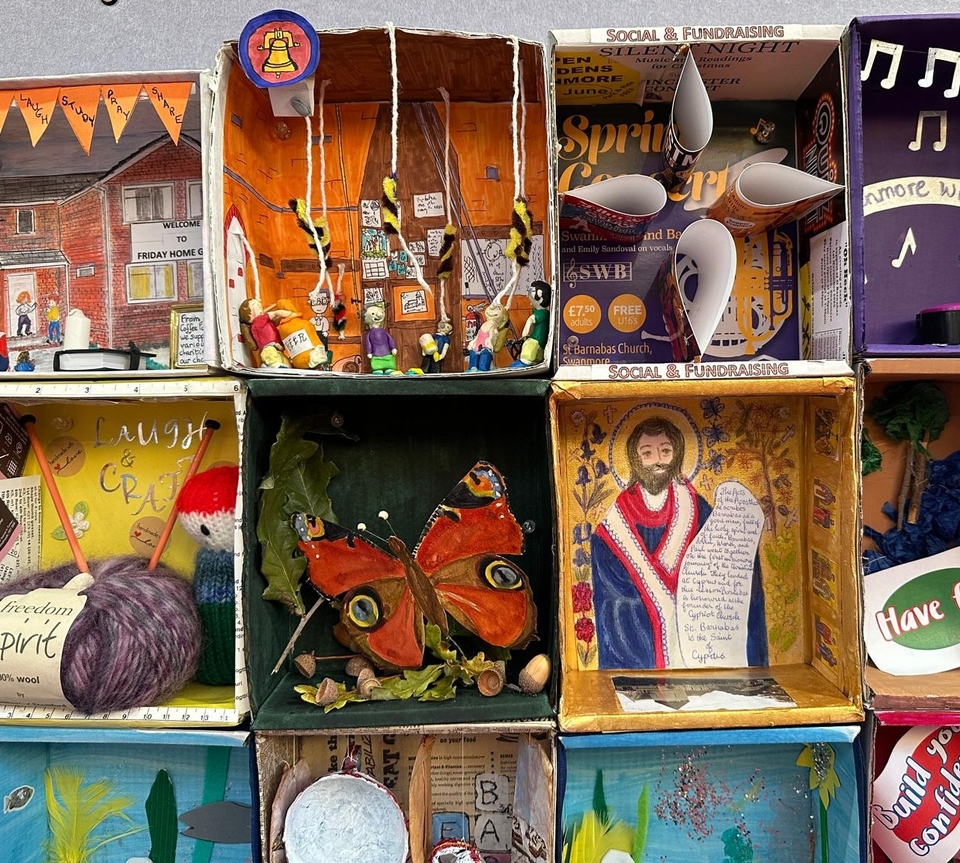 A close-up of the boxes, showing the one put together by the bell ringers