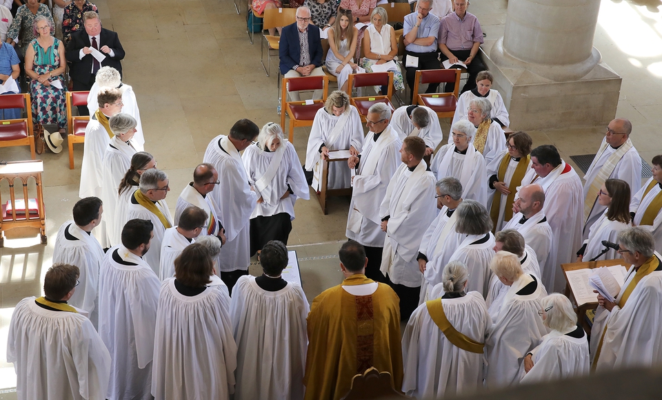 The moment before the Rev Amanda Sim is ordained as a priest by Bishop Jonathan