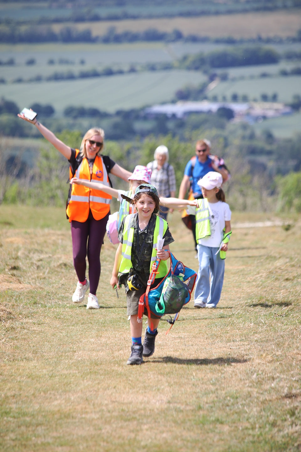 Children from Swanmore CofE Primary School reaching the top of Old Winchester Hill
