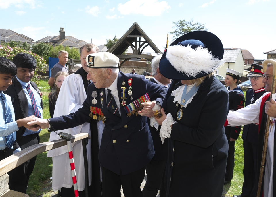 Navy veteran Alec Penstone, aged 100, is welcomed to Christ Church, Sandown (Photo: Michael Dunkason)