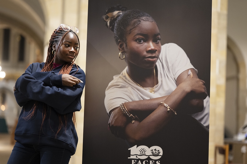 Tano Osu-Bovi, aged 17, with the photographic portrait of her taken by Pete Langdown
