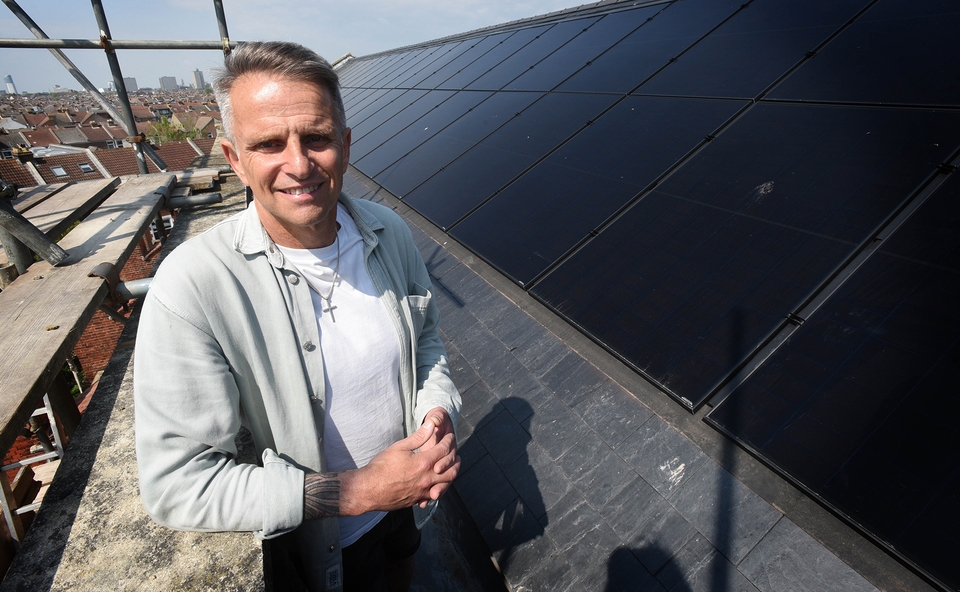 Rev Fran Carabott with the new solar panels. Photo: Clare Kendall