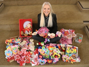 Knitted hearts carry Christmas message of love