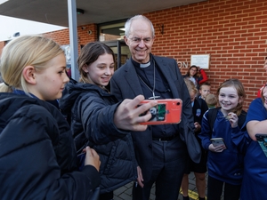 Island schoolchildren and churchgoers quiz Archbishop