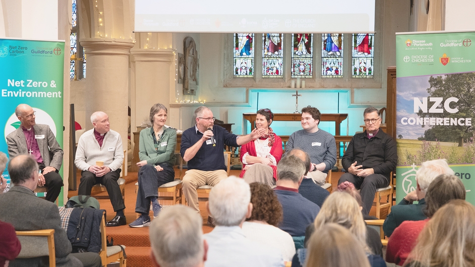 A panel fields questions from the conference delegates