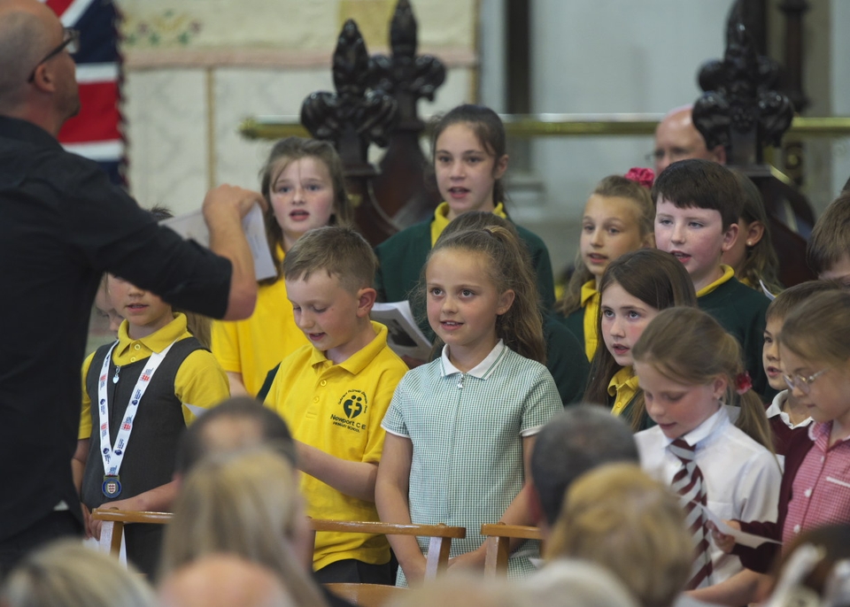 Pupils from Newport CofE Primary School sing as part of the service at Newport Minster